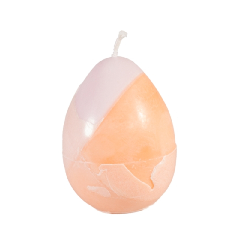 Kerze in Form eines Eis. Die obere Hälfte ist weiß, die untere Hälfte ist orange. Die Teilung des verschiedenfarbigen Wachses ist schräg durch die Mitte.